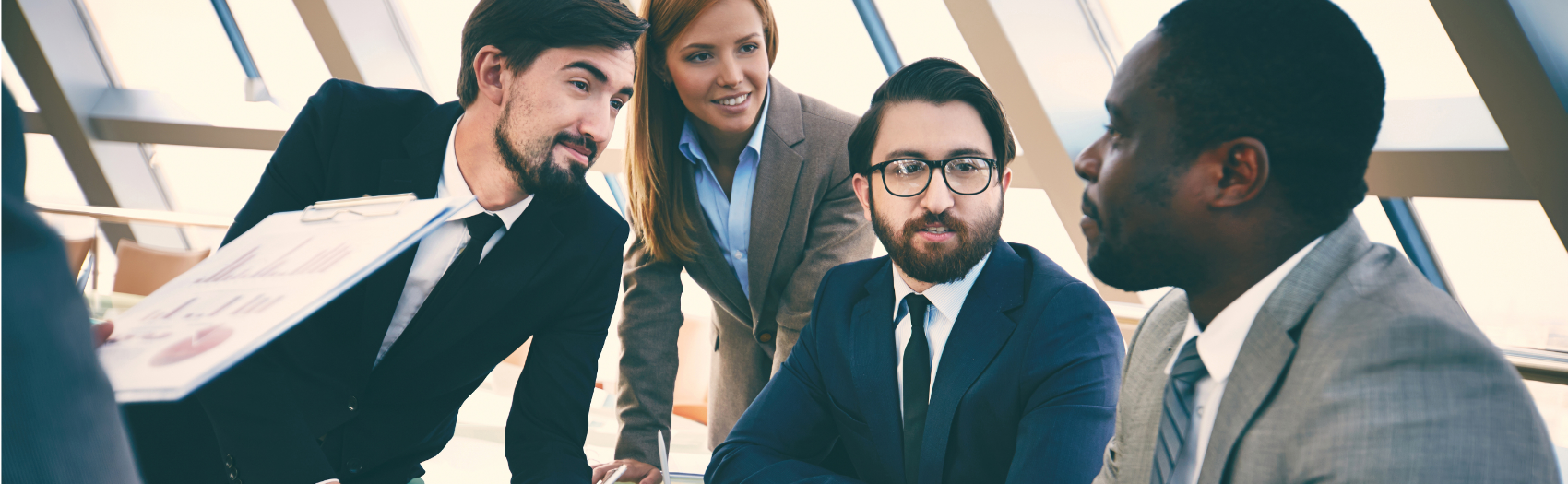 Healthcare Consulting firm meeting together in a conference room